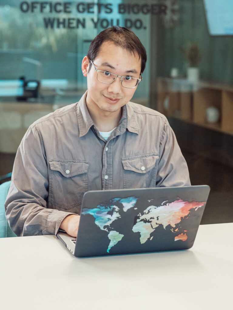 Professional using a laptop for nationwide remote online notary services